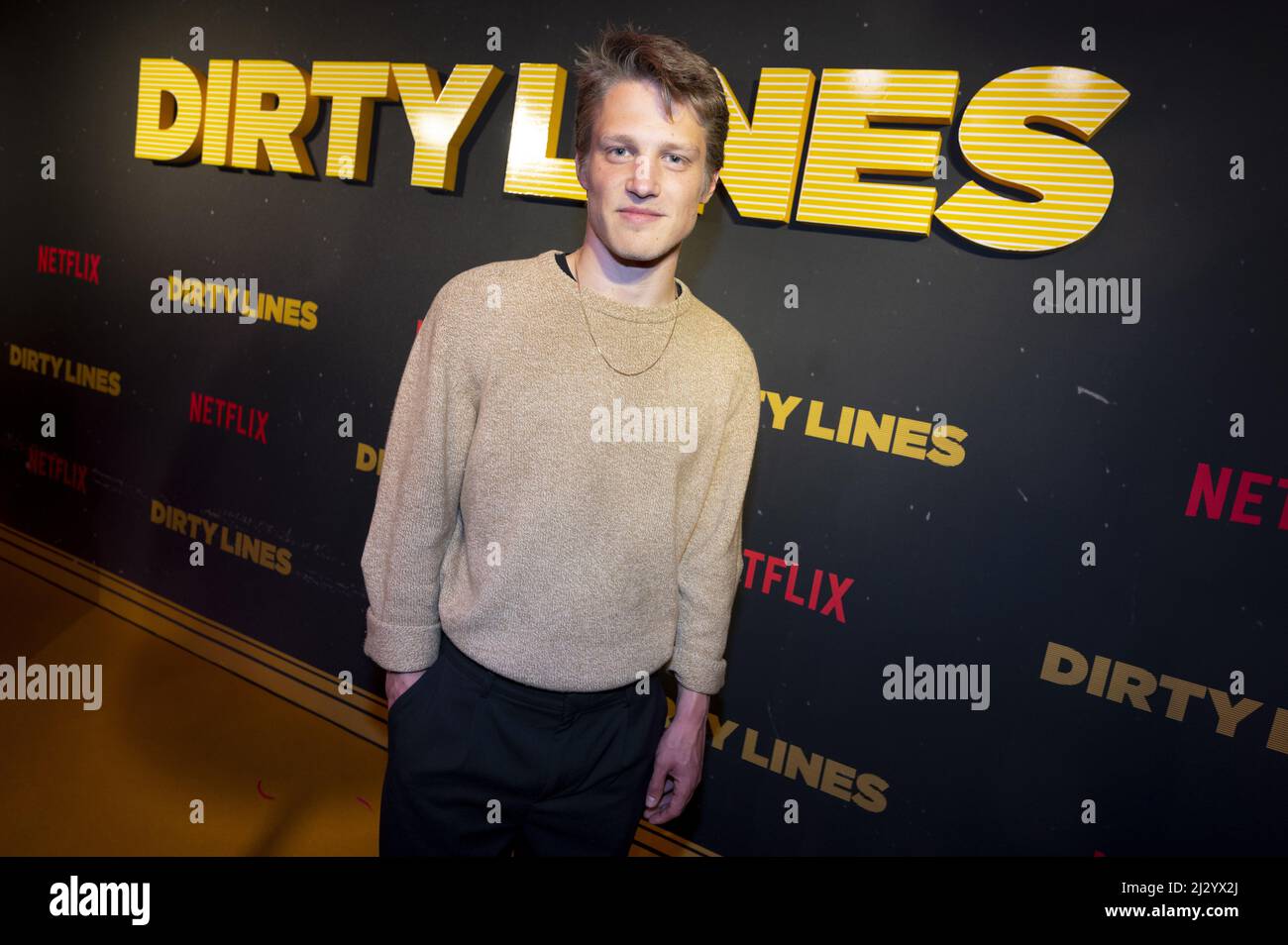 2022-04-04 18:29:27 AMSTERDAM - Joes Brauers on the red carpet for the premiere of the Netflix series Dirty Lines. The Dutch series is about life in Amsterdam in the 1980s. ANP KIPPA EVERT ELZINGA netherlands out - belgium out Stock Photo