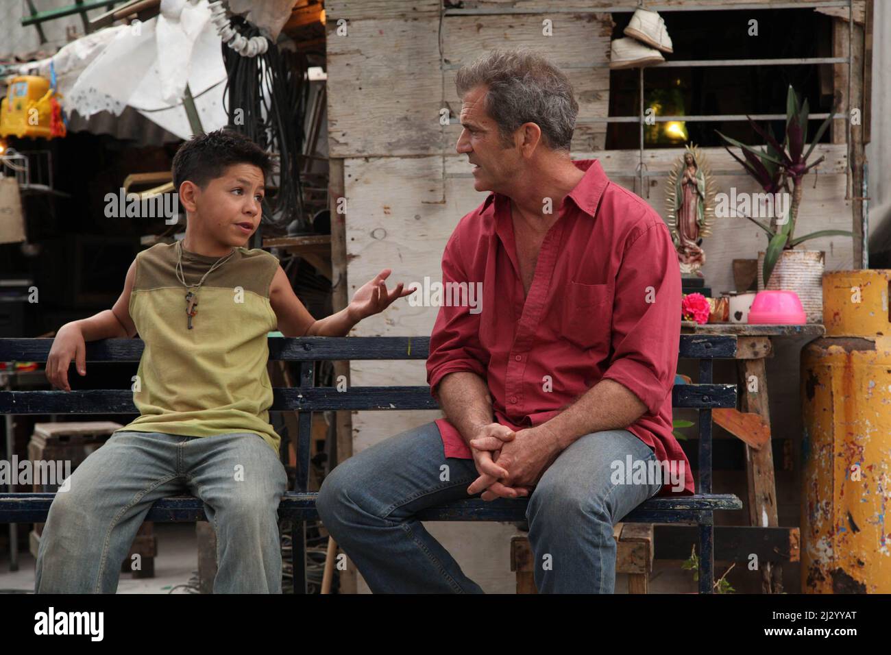 Los Angeles, CA, USA. Mel Gibson and Kevin Hernandez in the ©Icon Film new  movie: How I Spent My Summer Vacation ( Get the Gringo ) ( 2012 ). Plot: A  career
