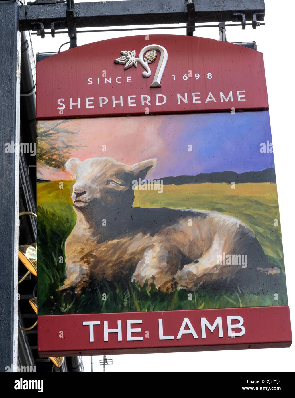 Traditional hanging pub sign at The Lamb - public house  - Abbey Street, Farnham, Surrey, England, UK Stock Photo