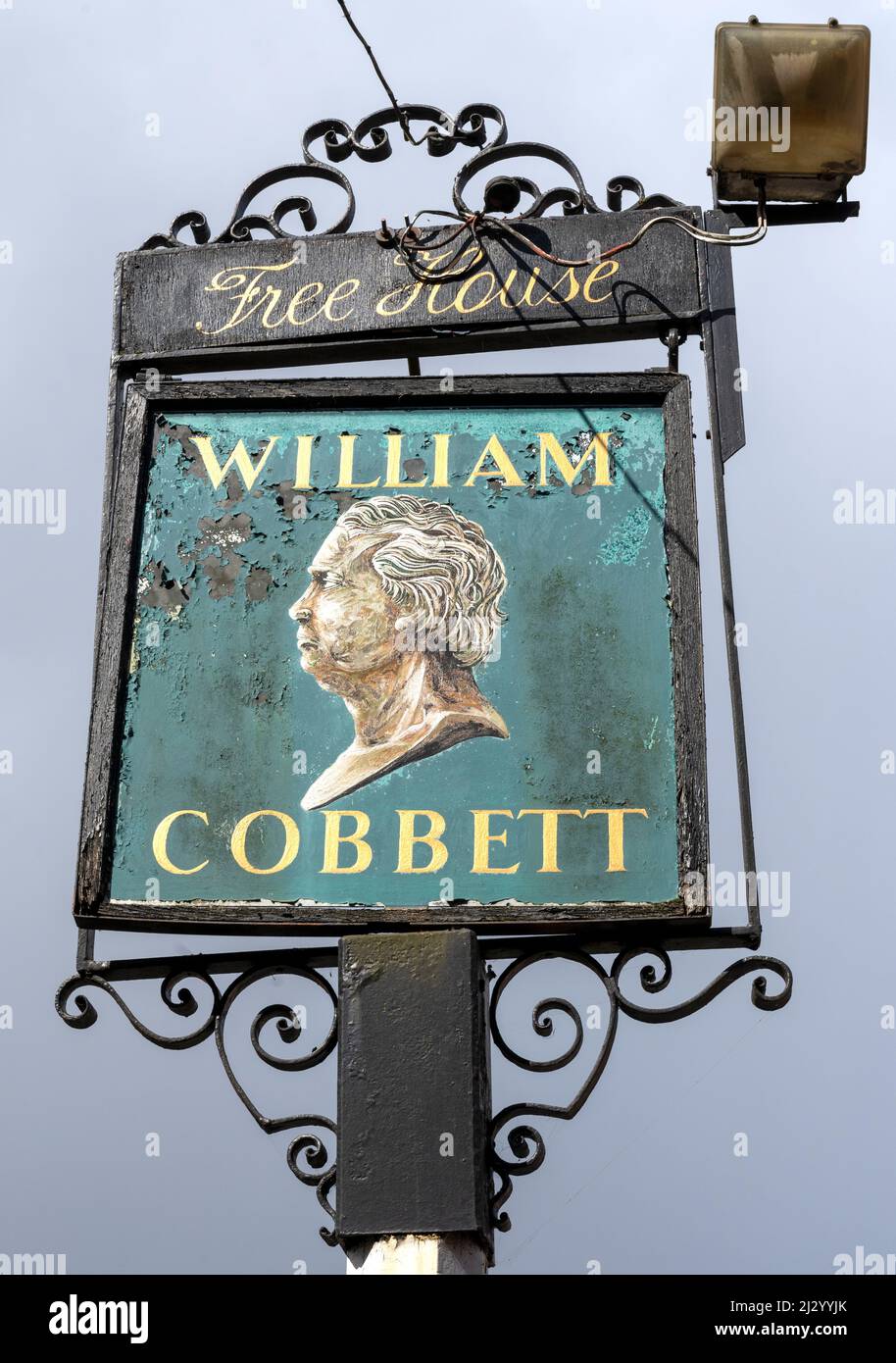 Traditional hanging pub sign at The William Cobbett public house, Bridge Square, Farnham, Surrey, England, UK Stock Photo