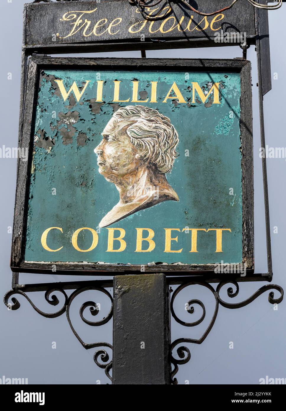 Traditional hanging pub sign at The William Cobbett public house, Bridge Square, Farnham, Surrey, England, UK Stock Photo