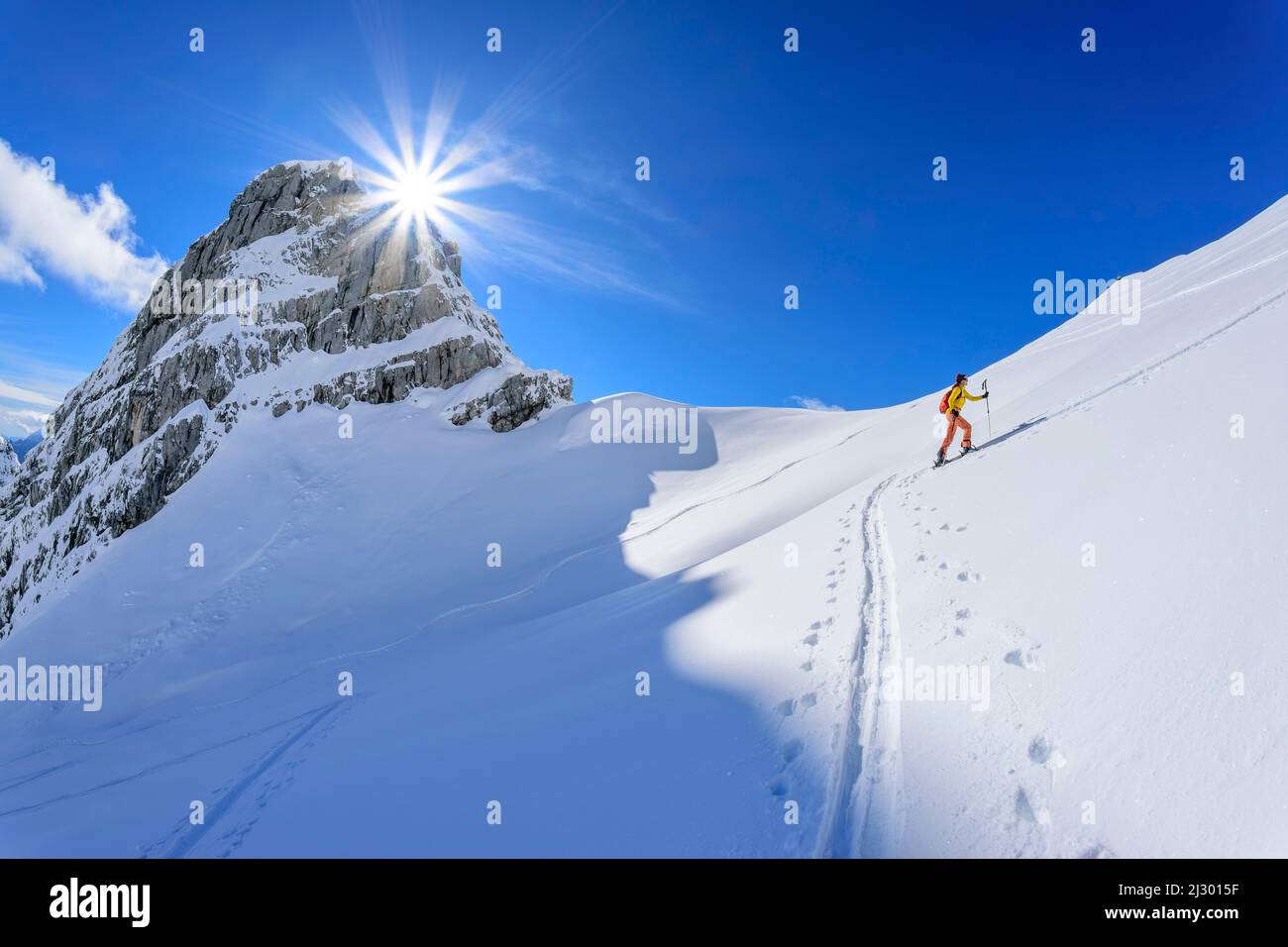 Woman on ski tour climbs up to Watzmannkar, Watzmannkar, Third Watzmannkind, Berchtesgaden Alps, Berchtesgaden National Park, Upper Bavaria, Bavaria, Germany Stock Photo