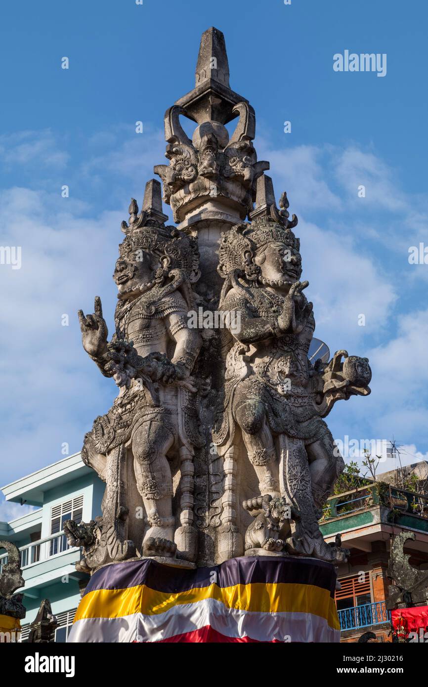 Bali, Indonesia.   Kanda Pat Sari Statue, Guardian of the Four Directions, in a Traffic Roundabout.  Klungkung, Semarapura. Stock Photo