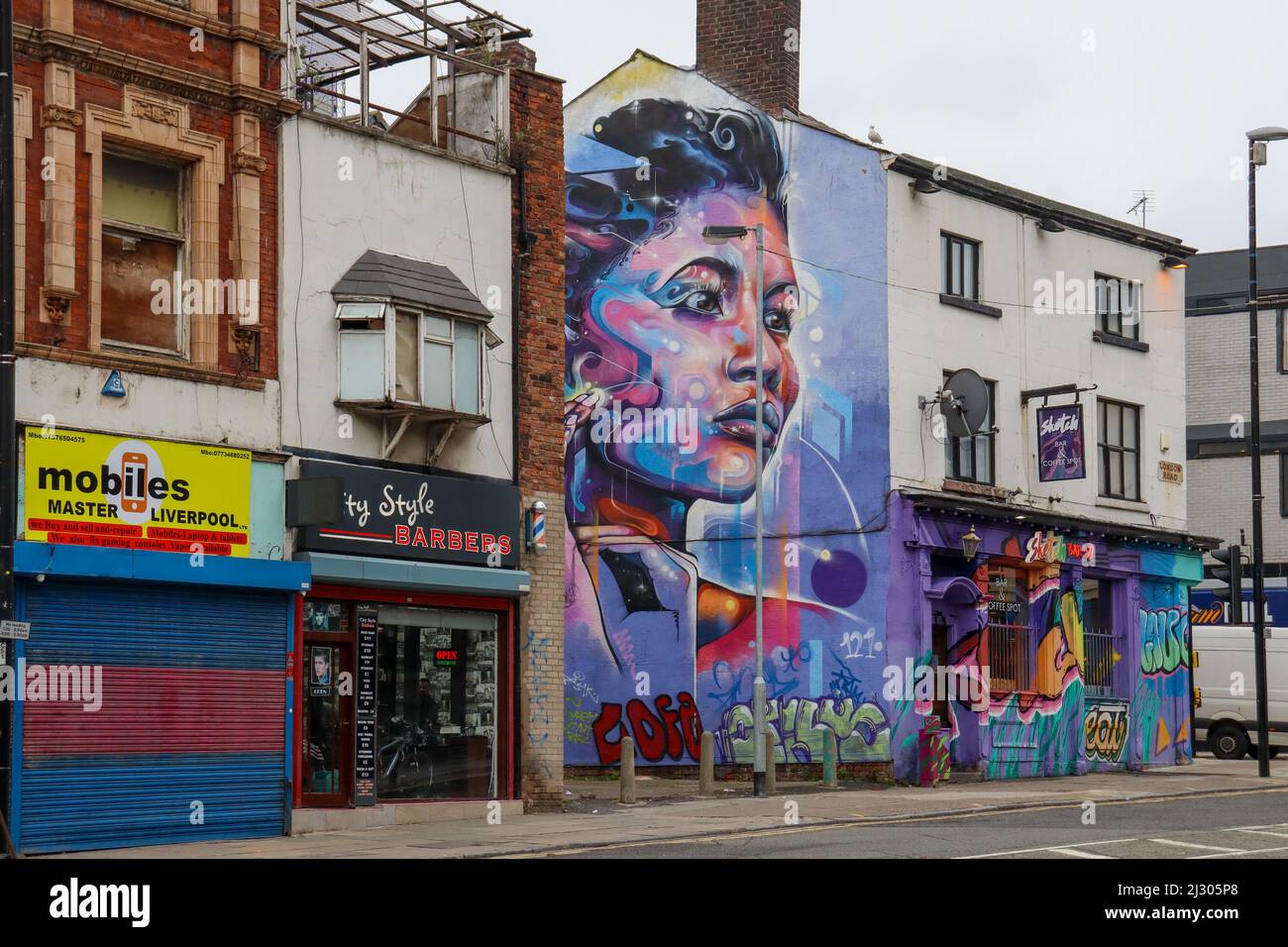 Large mural of a colourful women on the side of a building, Liverpool ...