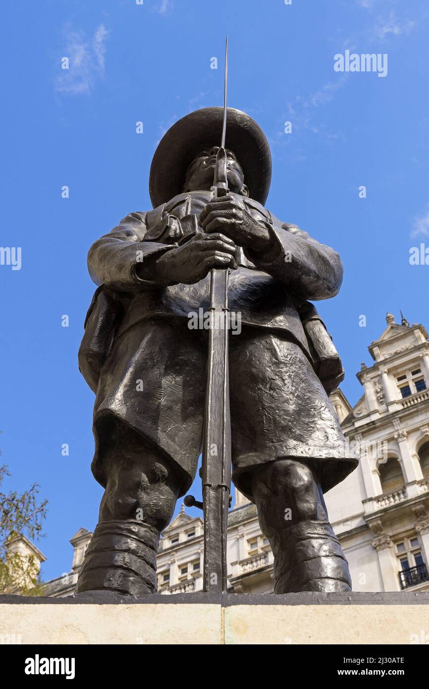 The Memorial to the Brigade of Gurkhas on Horse Guards Avenue. A Gurkha soldier statue holding a riffle. London - 2nd April 2022 Stock Photo