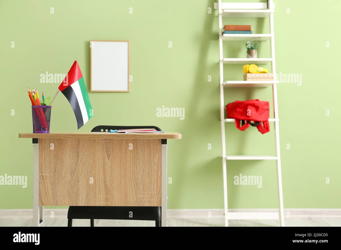 Stationery with UAE flag on desk in room Stock Photo Alamy