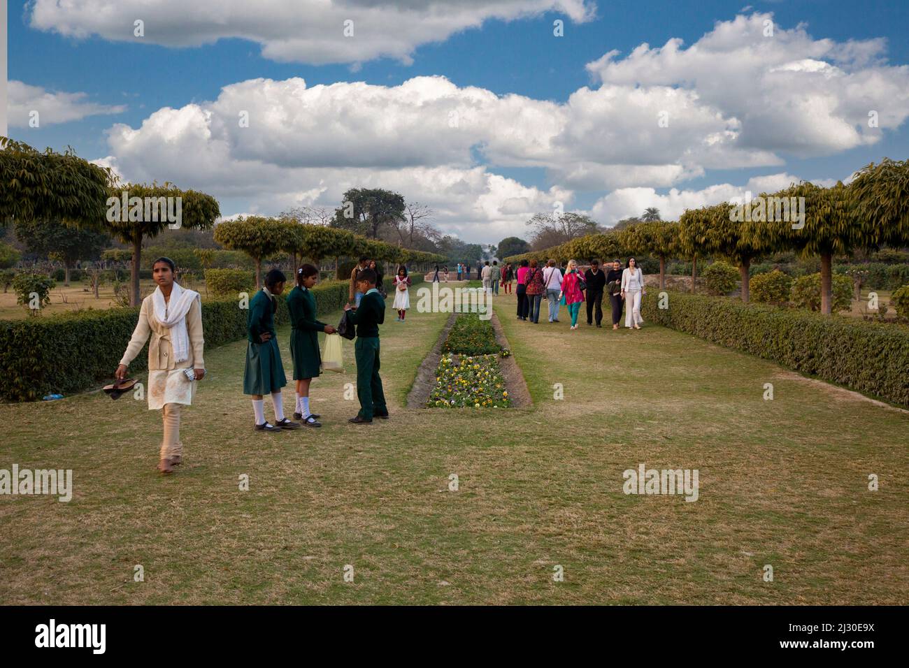Agra, India.  Indians Stroll in the Mehtab Bagh Gardens, across the Yamuna River from the Taj Mahal. Stock Photo
