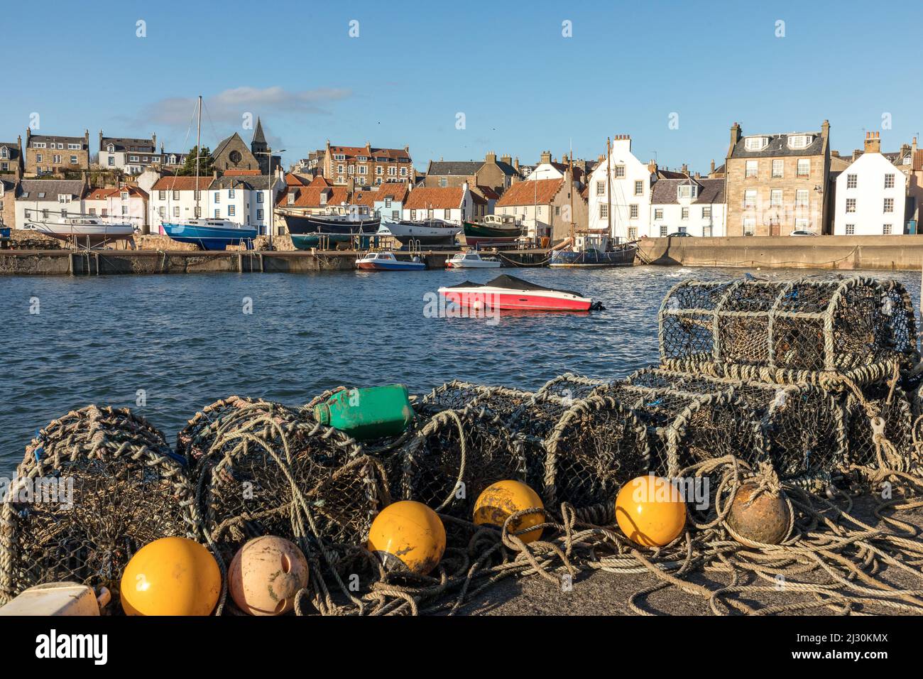 The harbor at St Monans, fishing village, lobster basket, boats, Fife, Scotland, UK Stock Photo