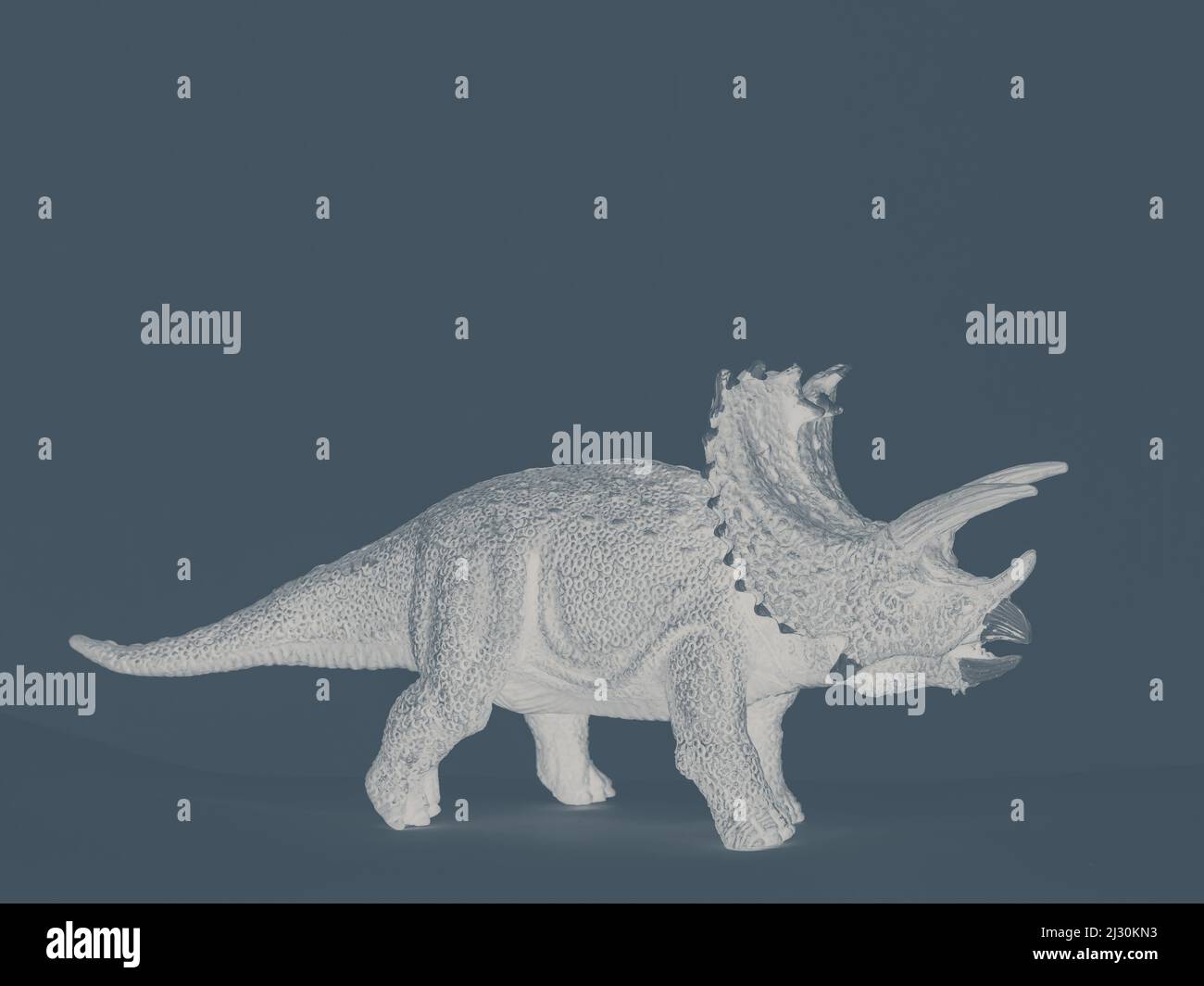 processed image of a plastic toy dinosaur Stock Photo
