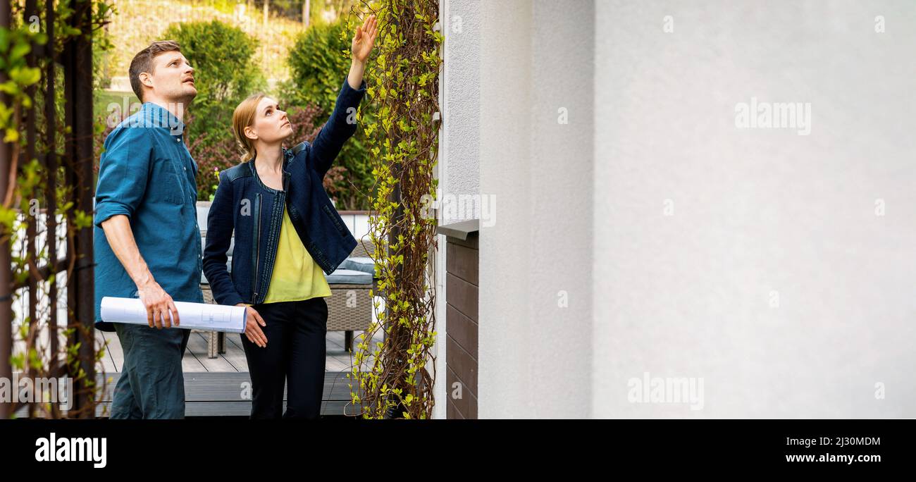 real estate agent and appraiser doing house inspection. property