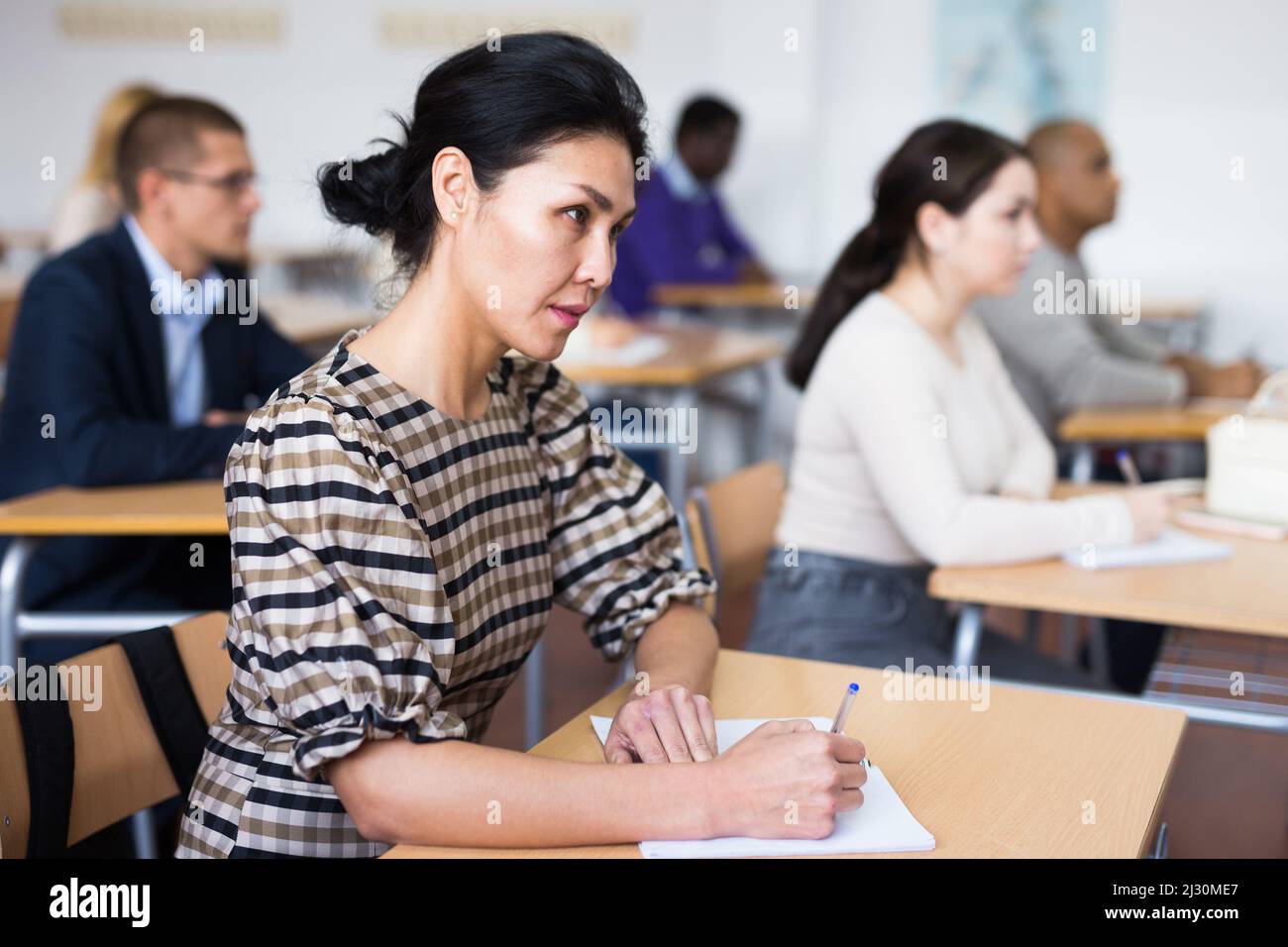 Young woman working during group business training Stock Photo