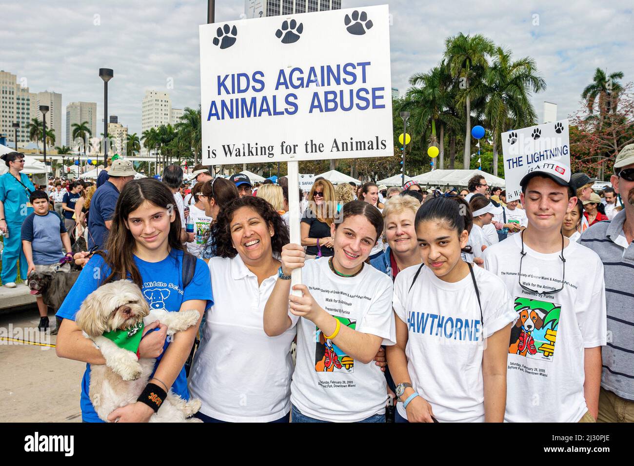 Miami Florida,Bayfront Park,Walk for Animals,Humane Society event,holding dog,Kids Against Animal Abuse,teen teens teenage teenagers supporting cause Stock Photo