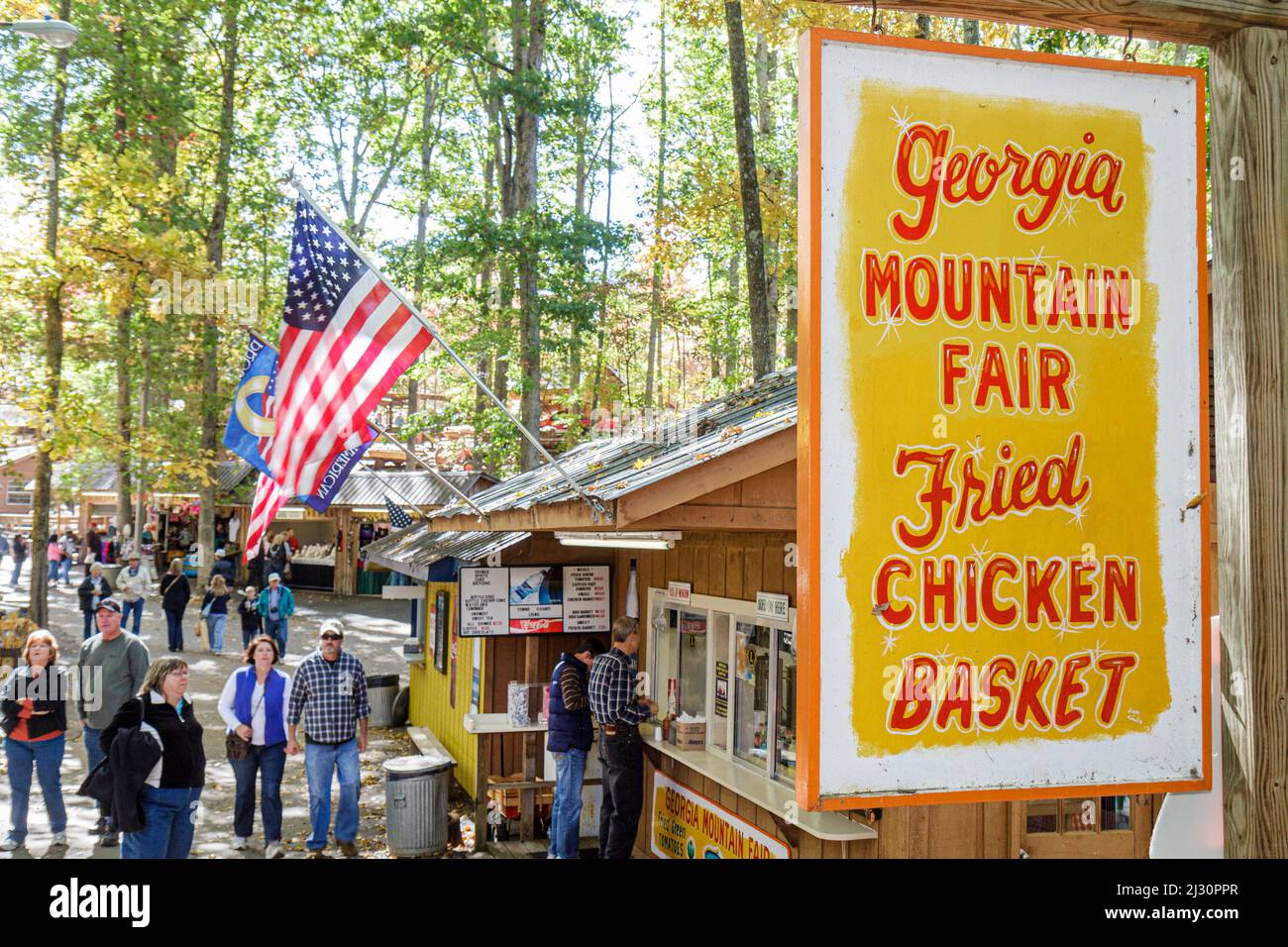 Hiawassee Georgia,Georgia Mountain Fairgrounds,Fall Festival,Southern Appalachian heritage food vendor fried chicken sign visitors Stock Photo