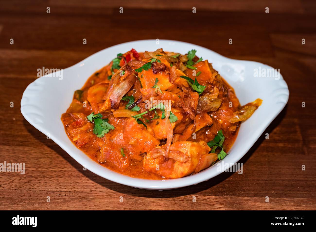 It's a delicious chicken curry in a rich thick sauce made from gently