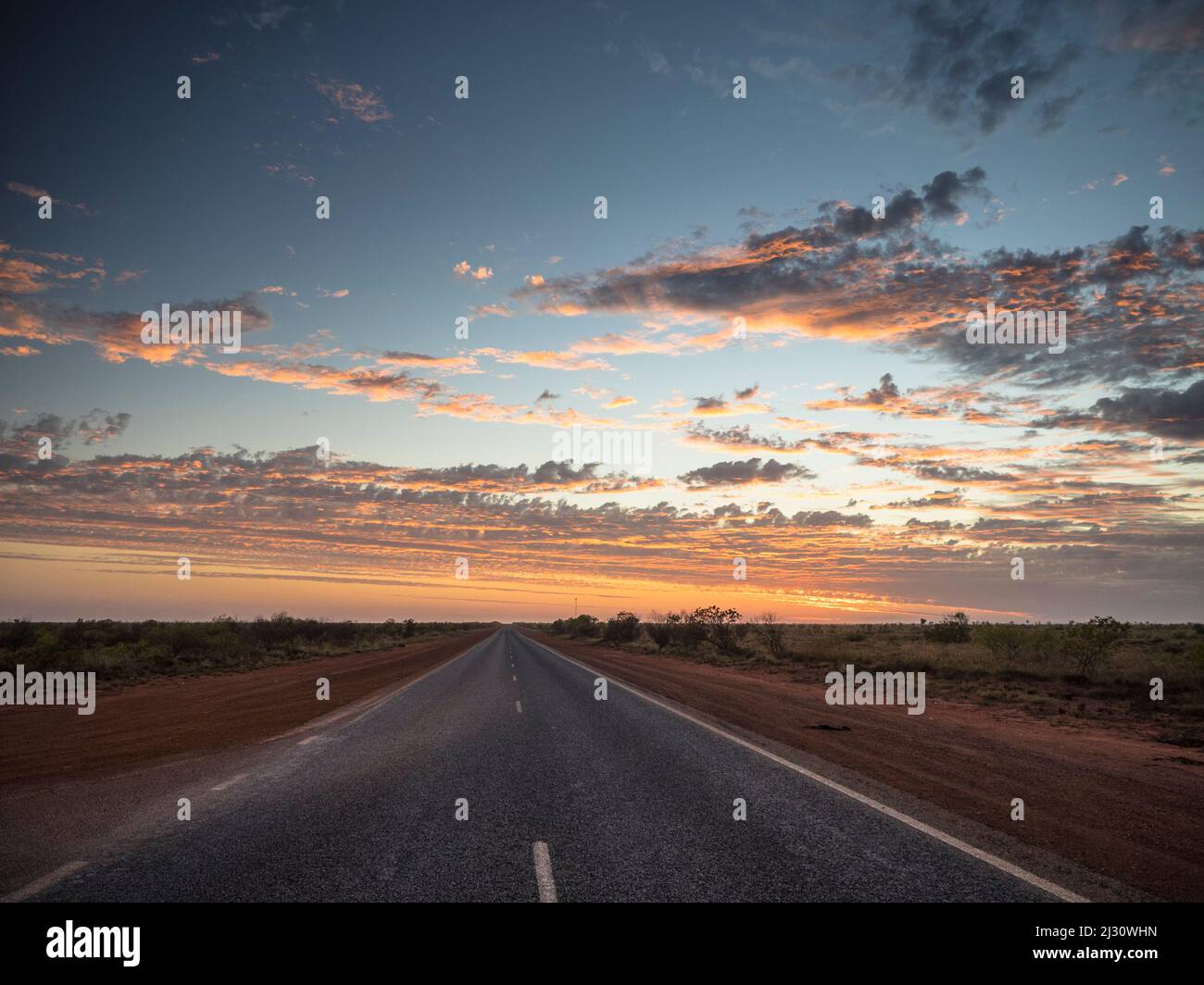 Sunrise over the Great Sandy Desert from the Great Northern Highway near 80 Mile Beach. Stock Photo