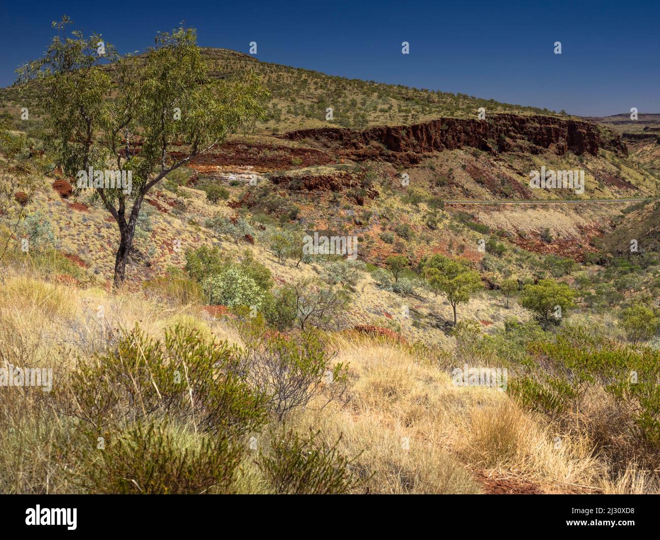 Munjina East Gorge carries the Great Northern Highway through the Hamersley Range, Juna Downs, Pilbara, Western Australia Stock Photo