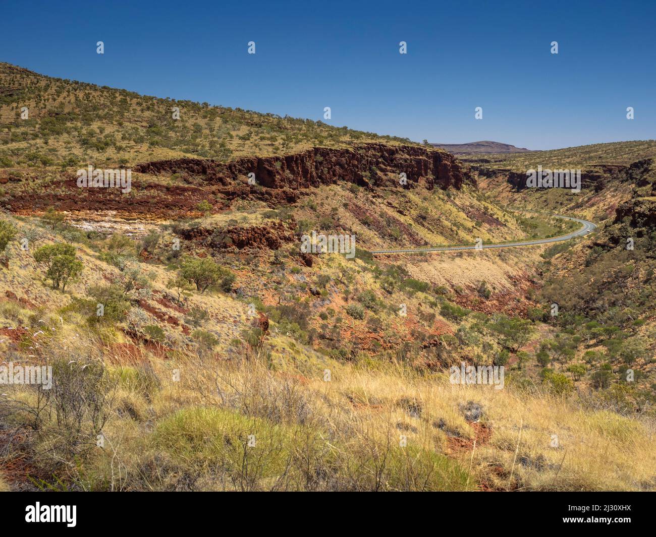 Munjina East Gorge carries the Great Northern Highway through the Hamersley Range, Juna Downs, Pilbara, Western Australia Stock Photo