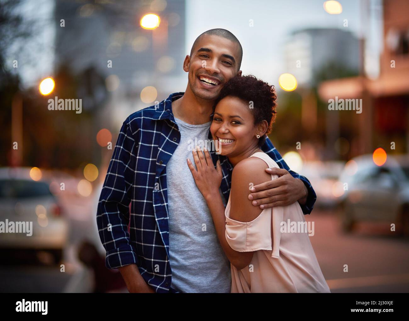 We love being out on the town. Cropped portrait of an affectionate young couple out on a date in the city. Stock Photo