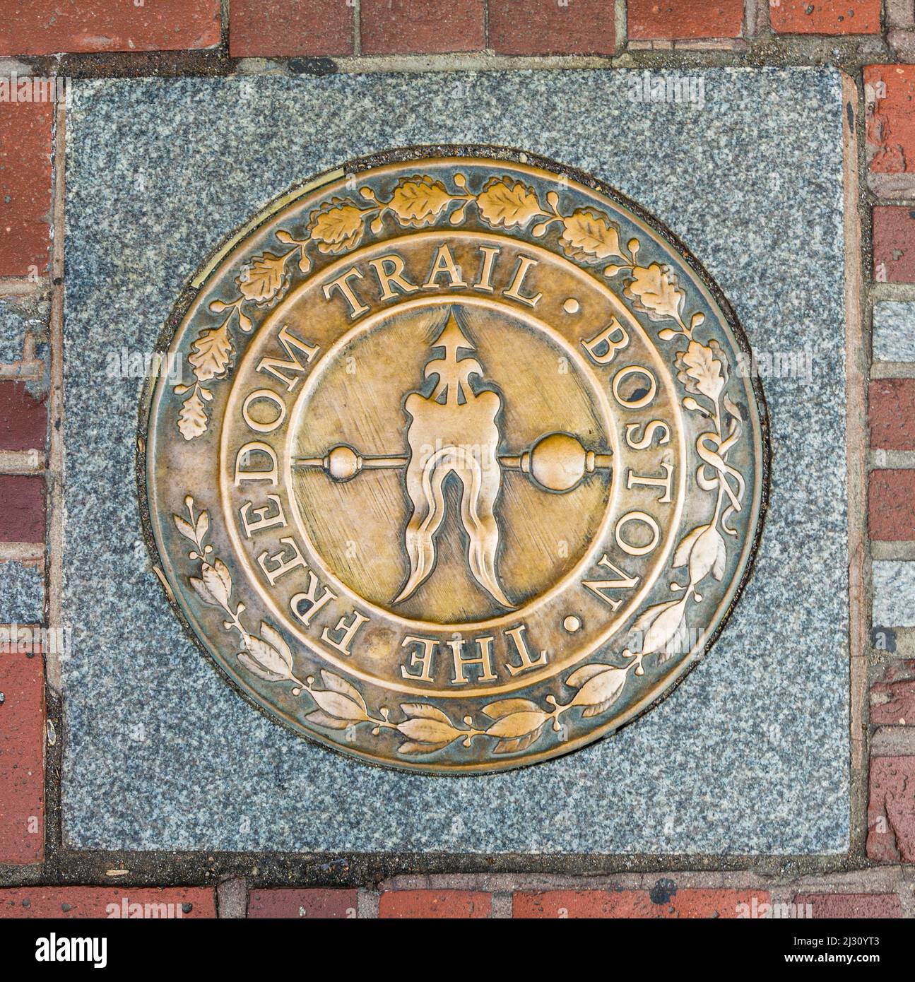 BOSTON, USA - SEP 12, 2017: the marker Boston freedom trail guides the tourists around the attractions in Boston. Stock Photo