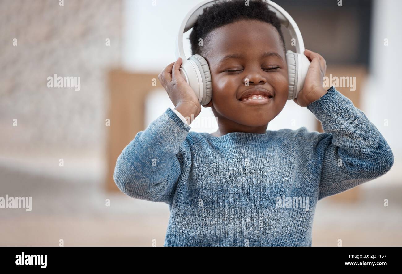 Little boy with headphones hotsell