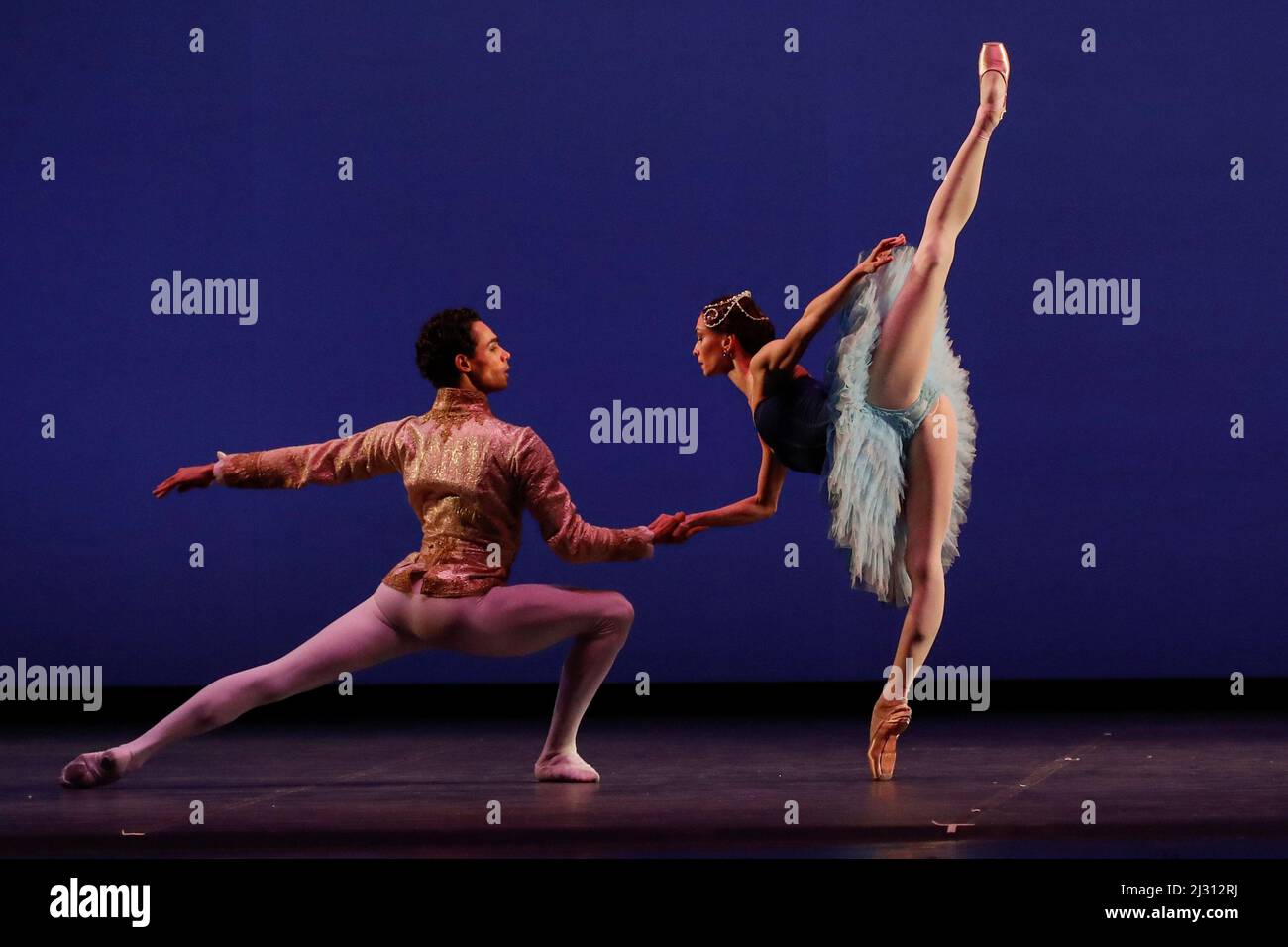 Naples, Italy. 04th Apr, 2022. Russian dancer Olga Smirnova (R), one of the biggest stars of dance, who left the Bolshoi in Moscow after denouncing the invasion of Ukraine, and Brazilian dancer Victor Caixeta perform on stage during the fundraising gala 'StandWithUkraine - Ballet for Peace' at the San Carlo theater in Naples. Credit: Independent Photo Agency/Alamy Live News Stock Photo