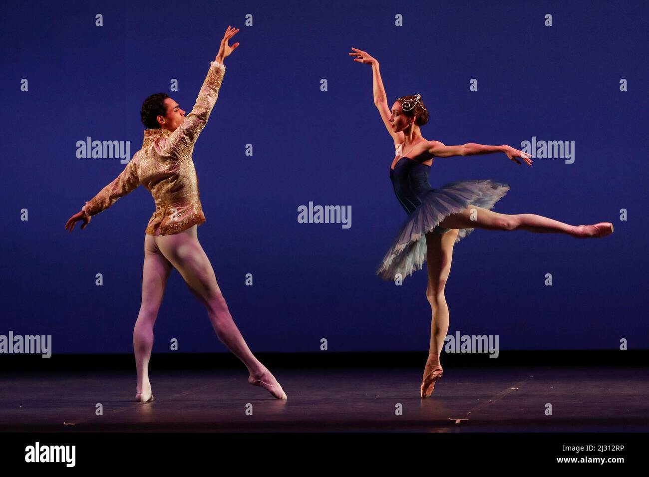 Naples, Italy. 04th Apr, 2022. Russian dancer Olga Smirnova (R), one of the biggest stars of dance, who left the Bolshoi in Moscow after denouncing the invasion of Ukraine, and Brazilian dancer Victor Caixeta perform on stage during the fundraising gala 'StandWithUkraine - Ballet for Peace' at the San Carlo theater in Naples. Credit: Independent Photo Agency/Alamy Live News Stock Photo