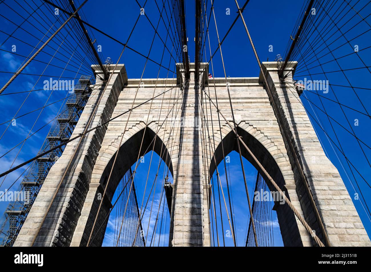stone tower of the Brooklyn Bridge Stock Photo