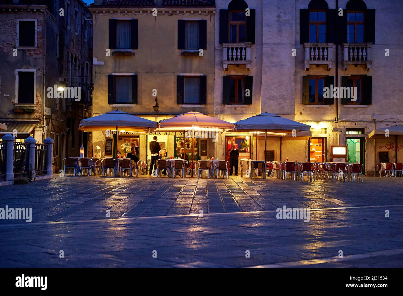 Evening view of the Ristorante / Bar Al Cavallo from Campo Santi Giovanni e Paolo, Venice, Italy, Europe Stock Photo