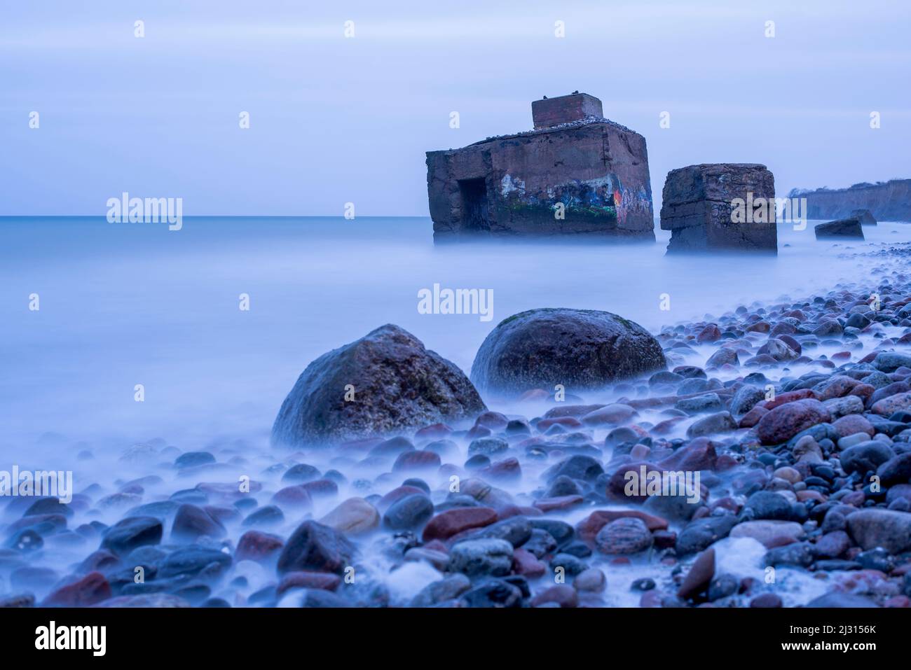 Old bunker in the sea, steep coast between Ahrenshoop and Wustrow, Fischland-Darss-Zingst Baltic Sea peninsula, Mecklenburg-West Pomerania, Germany Stock Photo