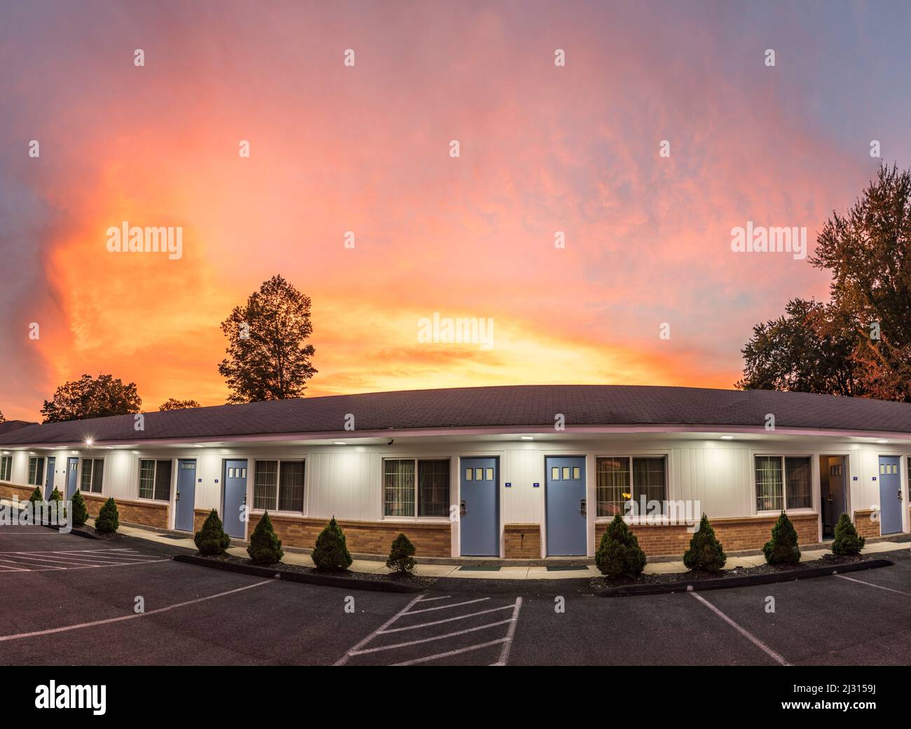 PITTSFIELD, USA - SEP 21, 2017: typical american Motel in Pittsfield, USA. These Motels are characterized by the parking lot in front of the room. Stock Photo