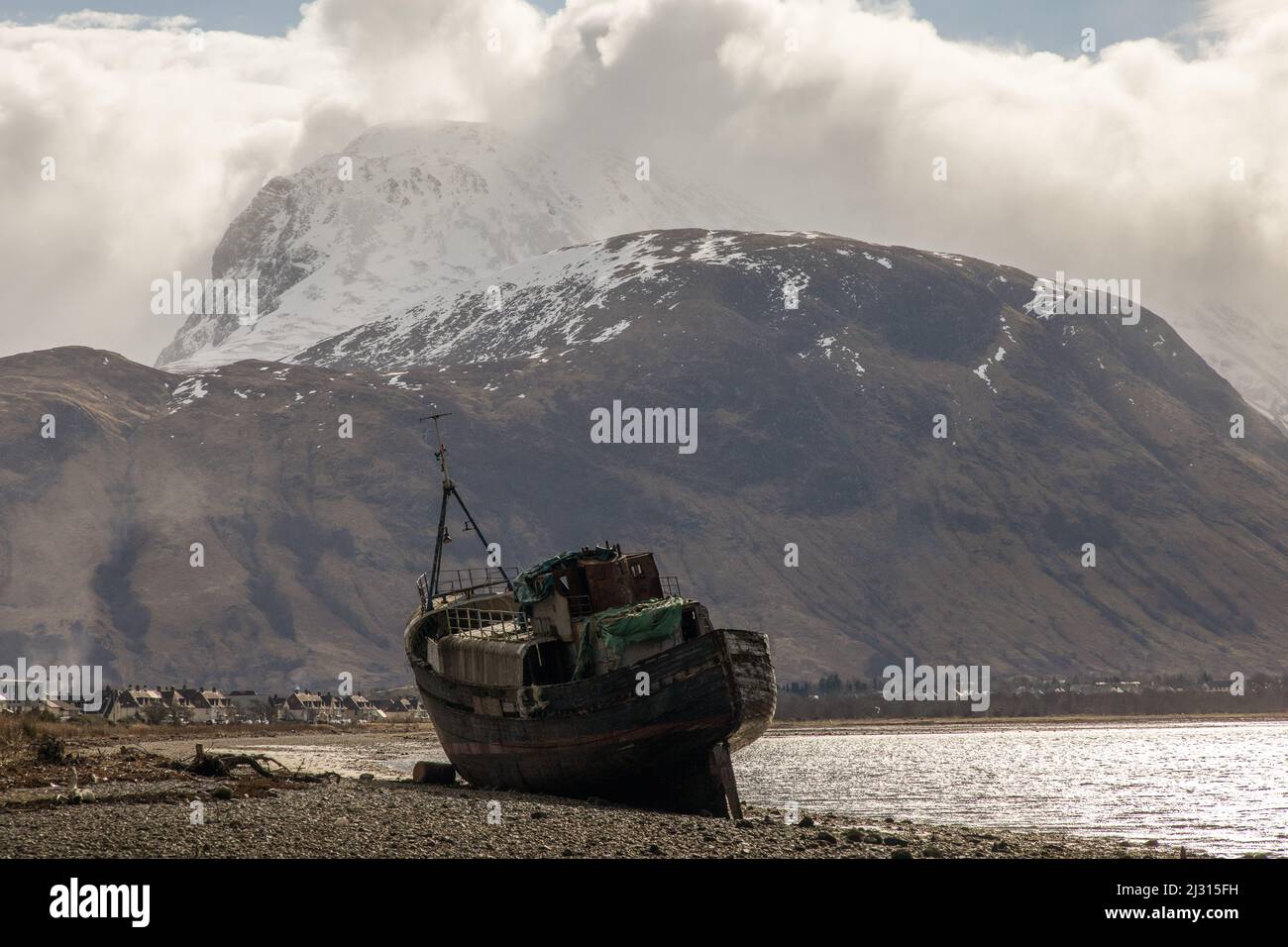 Landed shipwreck, Old Boat of Caol, Loch Eil, Ben Nevis, Scotland, UK Stock Photo