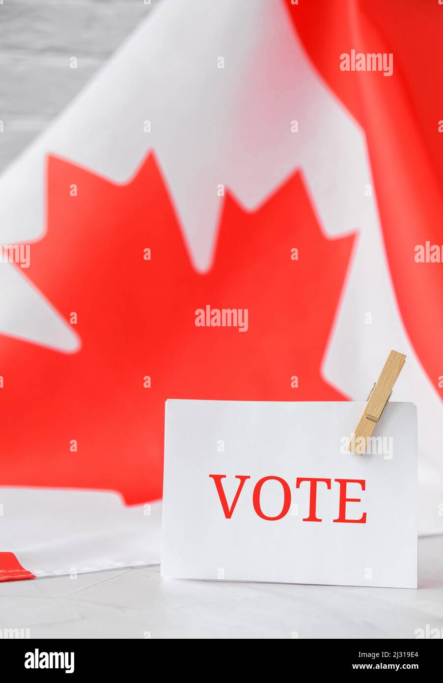 The National Flag of Canada. Canadian Flag or the Maple Leaf with paper