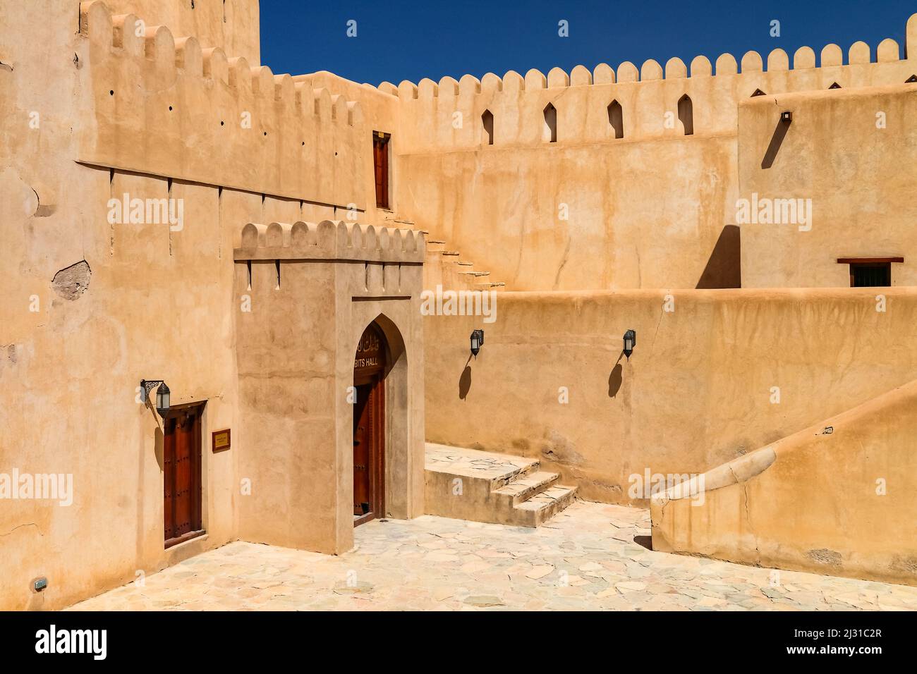 The fort of Nizwa protected the rich trading city in Oman from raids Stock Photo