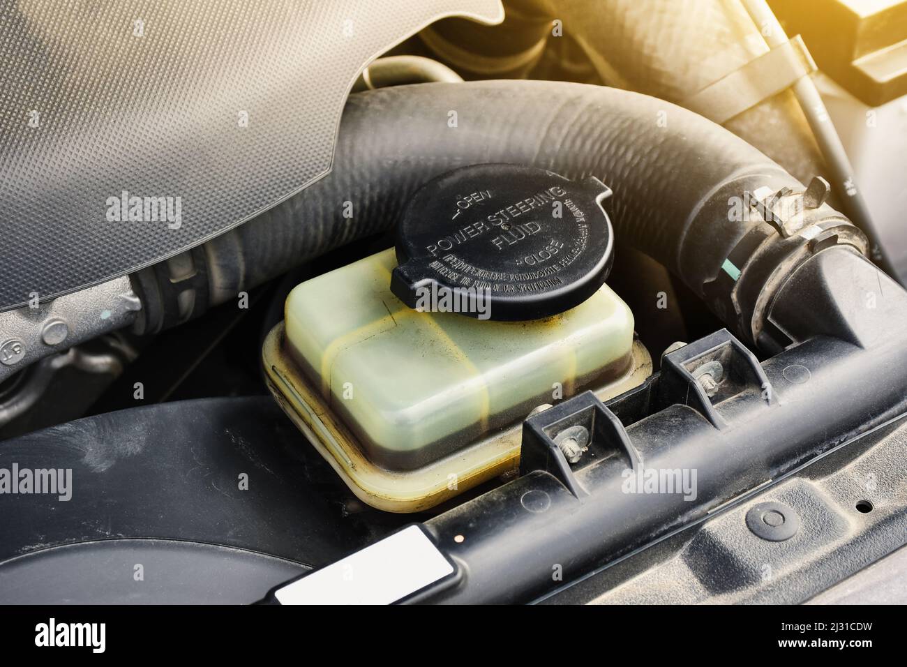 Power steering fluid reservoir of the hydraulic steering wheel in the