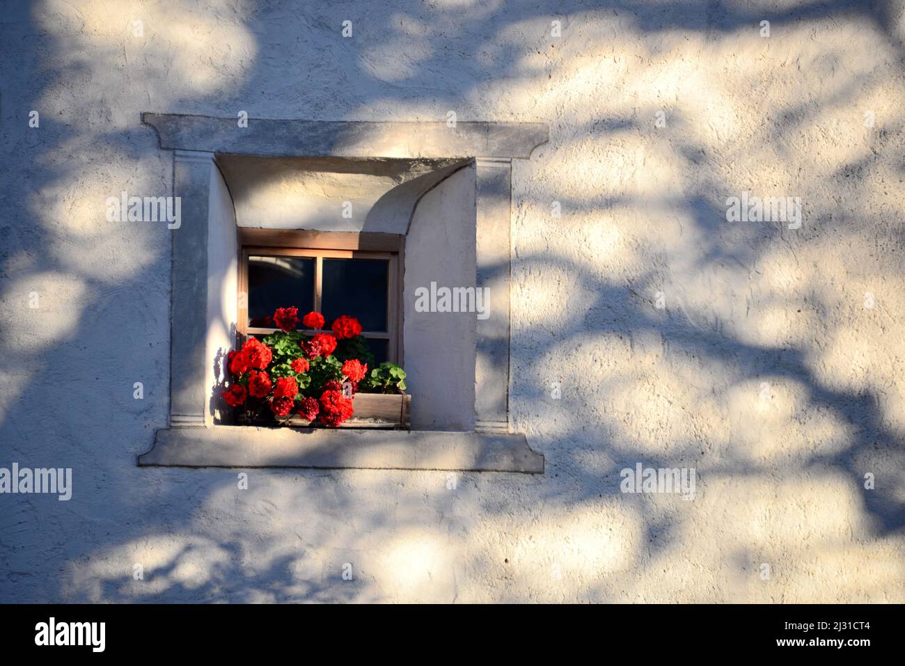 Puechfelderhof with old courtyard window near Lajen near Klausen above the Eisacktal, South Tyrol, Italy Stock Photo