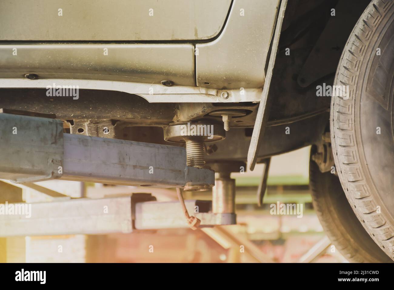 Car lifting point with a car lift for repair in the auto repair garage