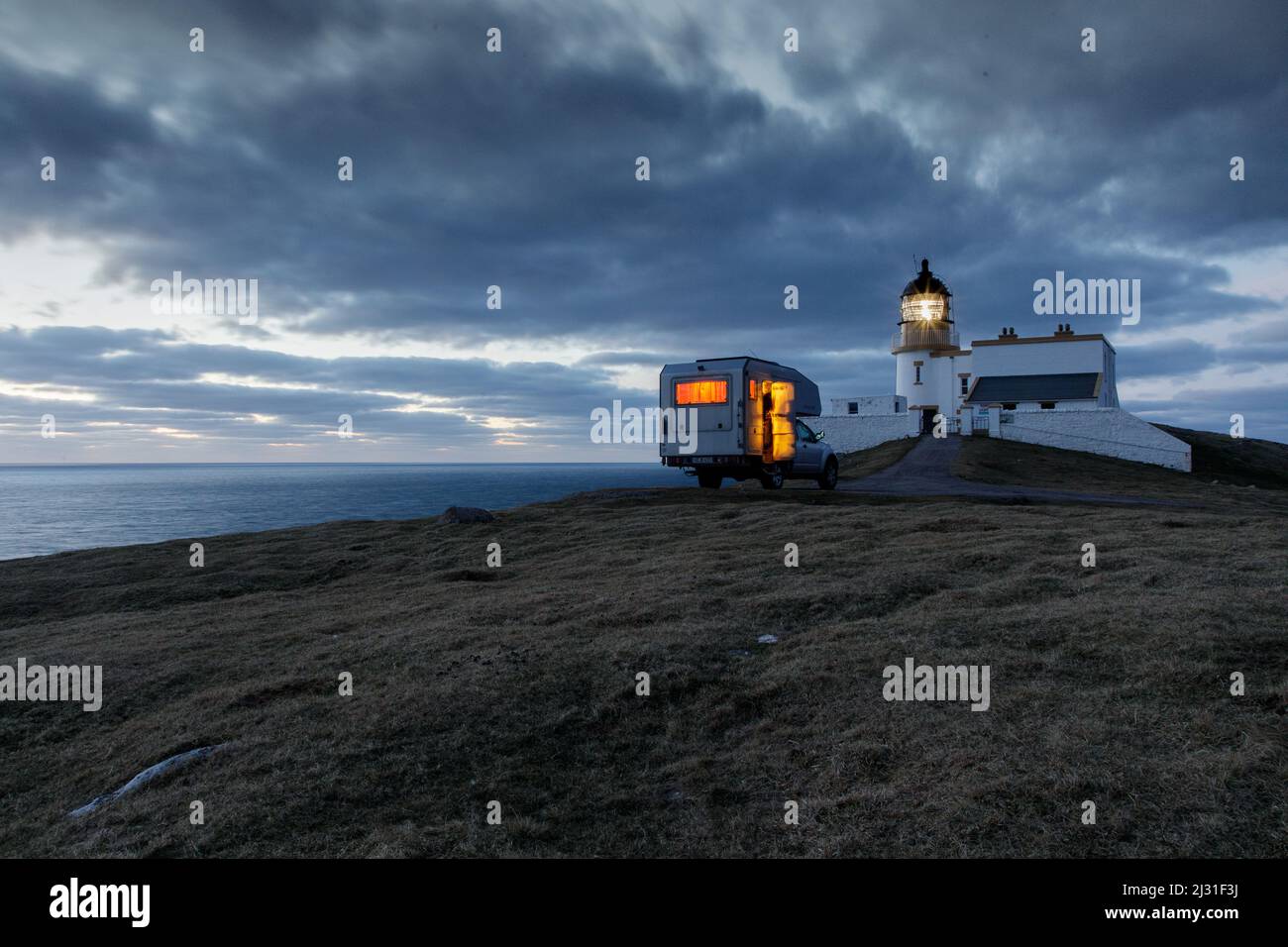 Camper, motorhome, four-wheel drive bimobile, overnight stay at Point of Stoer lighthouse, Assynt peninsula, Sutherland, Scotland UK Stock Photo