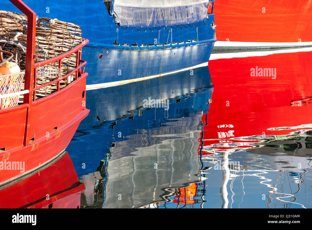 Reflection of colorful boats in the water, Halifax, Nova Scotia, Canada Stock Photo