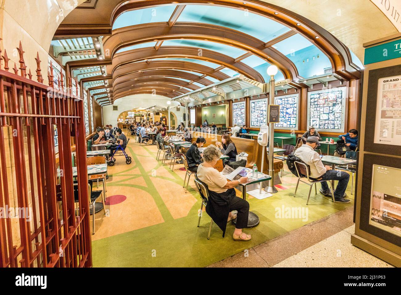 NEW YORK,  USA - OCT 6, 2017: people enjoy the food area in Grand Central Terminal in New York. It is the largest train station in the world by number Stock Photo