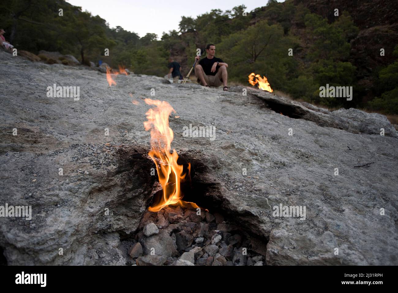 Chimaera flames, Mount Olympos, methane emissions which burning since the 4th century, Olympos national park, Cirali, Lykia, Turkey, Mediteranean sea Stock Photo