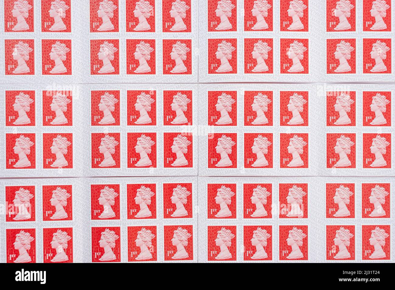 Rows of 1st class stamps Stock Photo