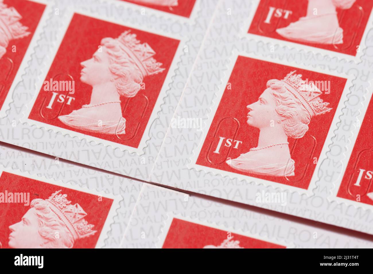 Close up of some 1st class stamps Stock Photo