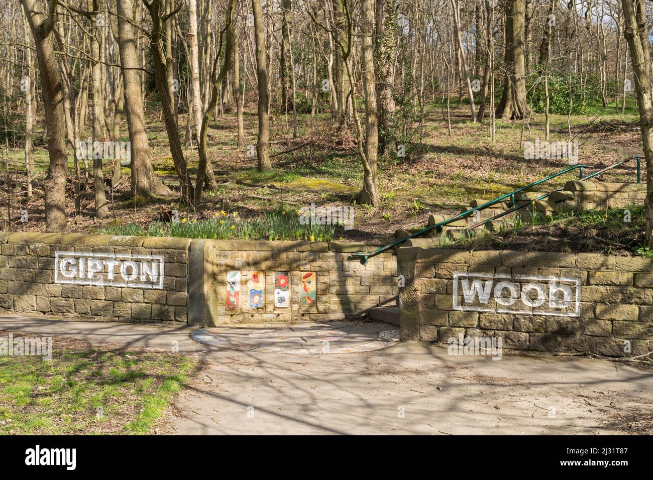 The entrance to Gipton Wood, an ancient woodland site, in Roundhay, Leeds, Yorkshire, England, UK Stock Photo