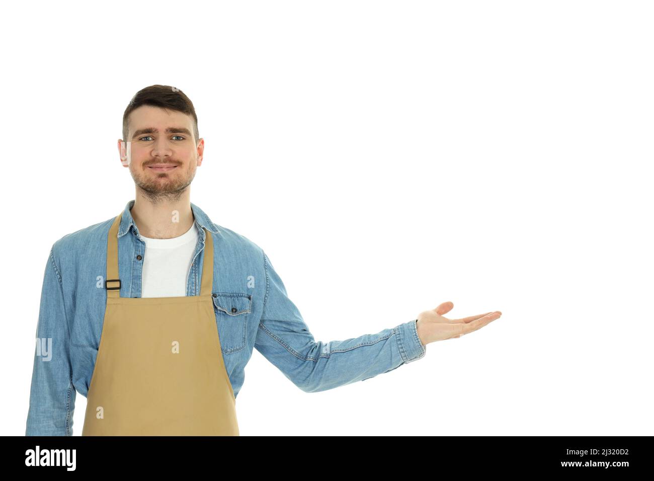 Young man waiter isolated on white background Stock Photo