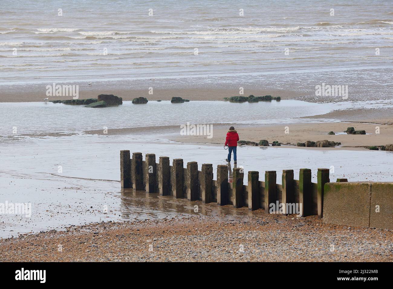 Hastings, East Sussex, UK. 05 Apr, 2022. UK Weather: Sunny morning in the seaside town of Hastings in East Sussex as Brits enjoy walking along the seafront while the tide is out. Photo Credit: Paul Lawrenson /Alamy Live News Stock Photo