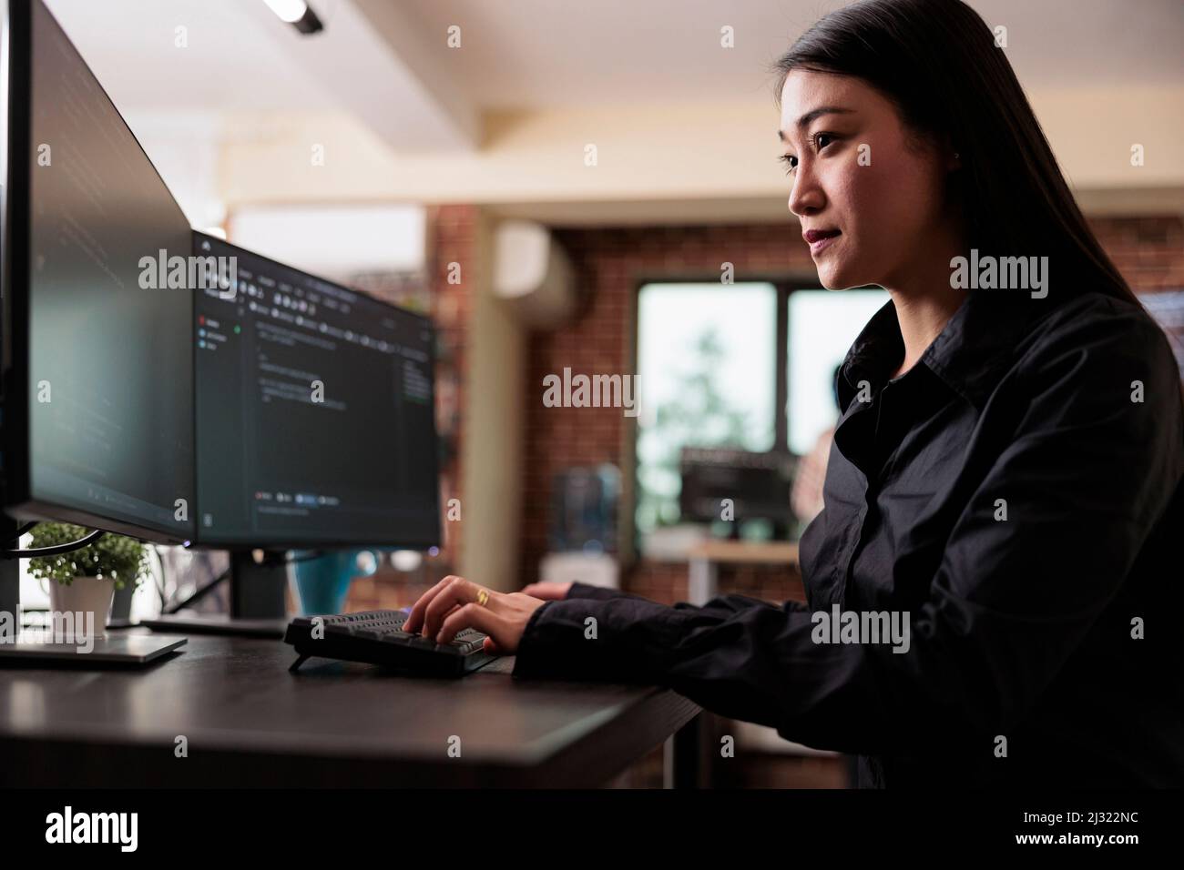 Cyber security company employee developing blockchain based database processing system. Cybernetic officer coding a machine learning software to protect mainframe encrypted files. Stock Photo