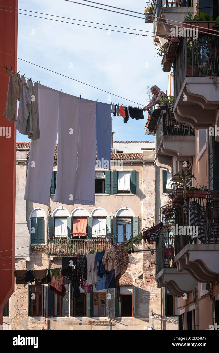 View of a street train with clotheslines in Cannareggio, Venice,