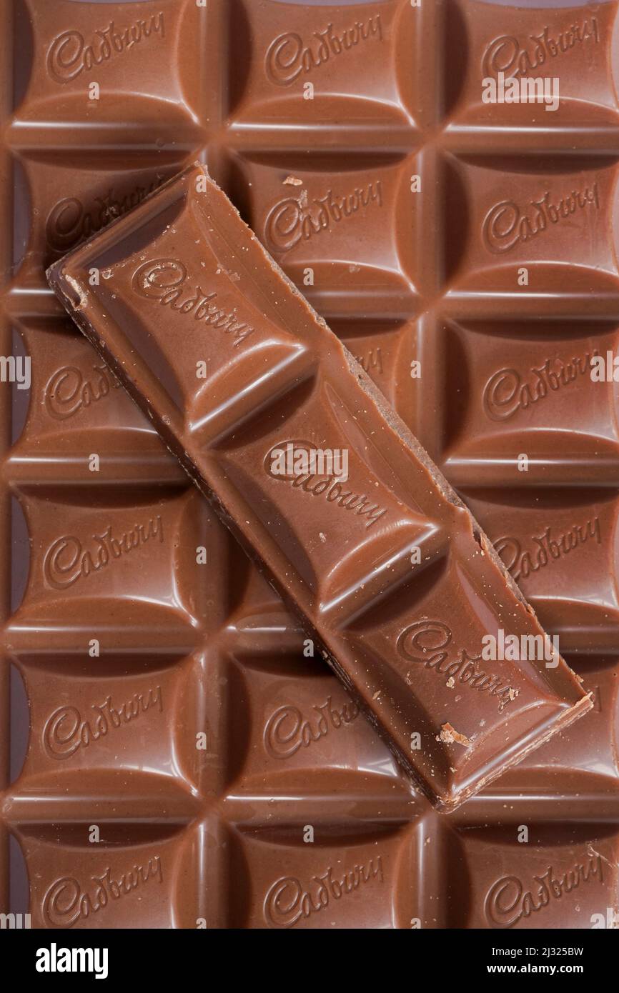 Bar of Cadbury's Dairy Milk milk chocolate bar unwrapped Stock Photo - Alamy