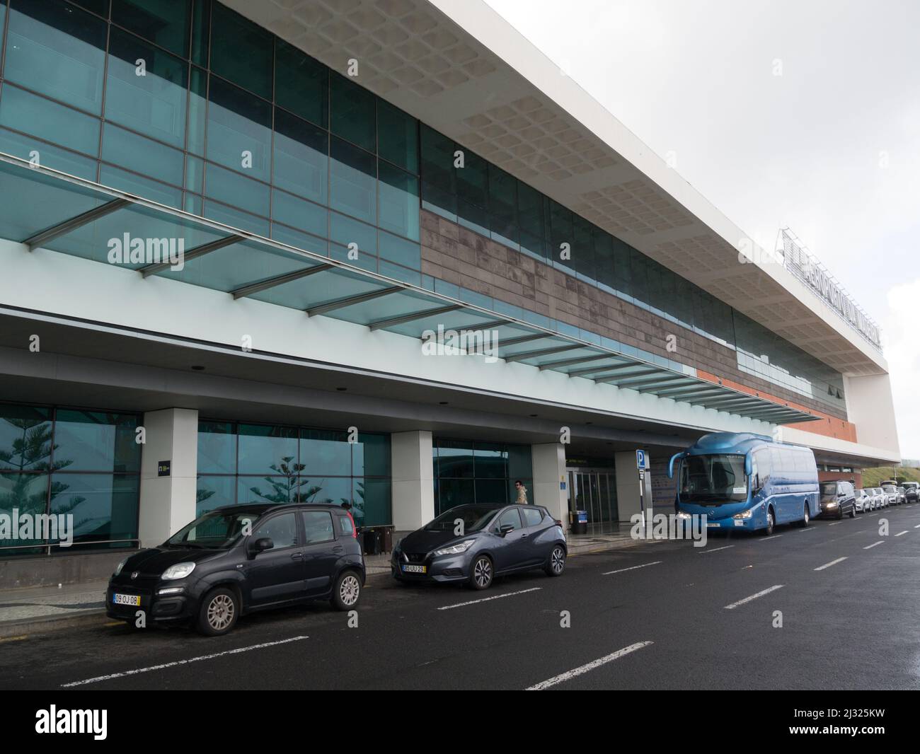 Entrance to Funchal airport Madeira Portugal EU with tourist bus and