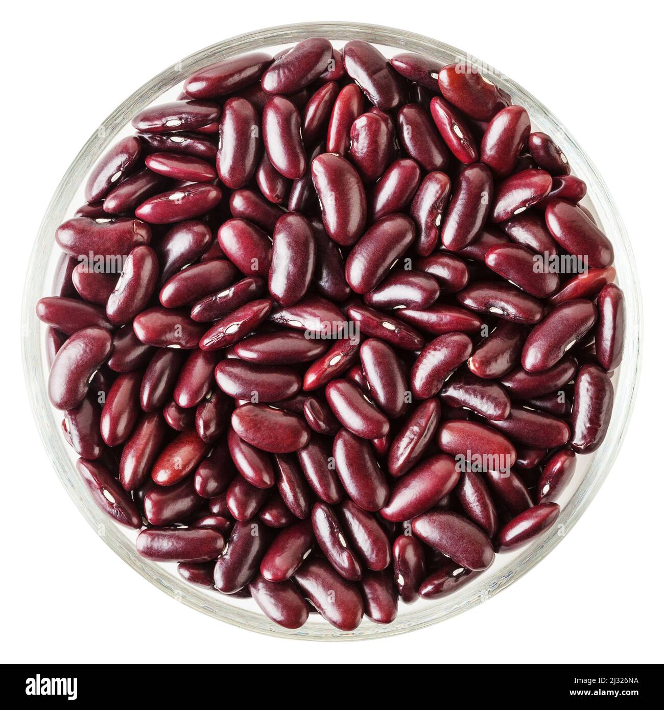 Uncooked red kidney beans in glass bowl isolated on white background